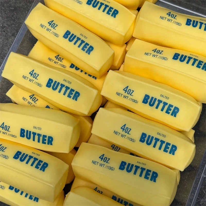 Butter-Stick Squishy Stressbal – Party Games Shop Bewertung und Preis